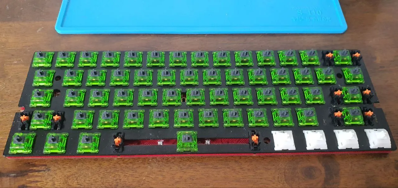 All of the switches back in place on the PCB and plate.